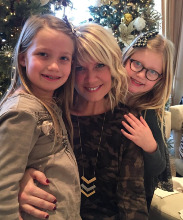 Natalie Grant poses for a Christmas photo with twin daughters Grace and Isabella in this undated photo.